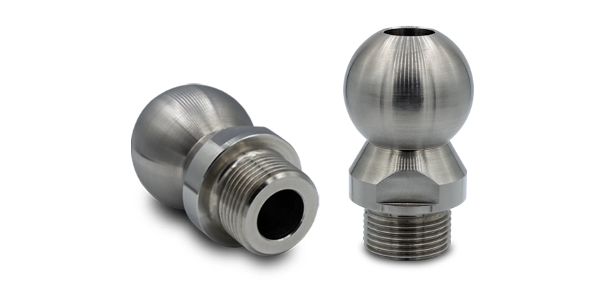 Industriefotografie von Präzisions-Drehteilen aus Stahl.